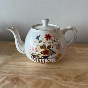 Sweet ceramic floral teapot with gold foil details